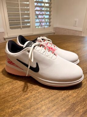 Nike Women’s White Sneakers with Black Swoosh and Pink Accents